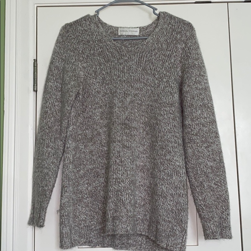 Knit sweater.